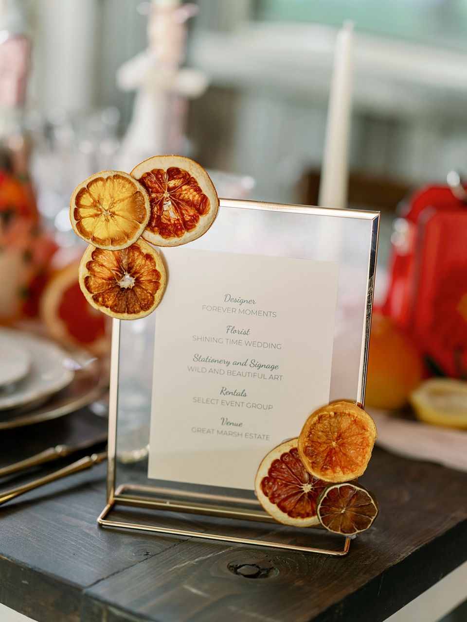 Golden sign with dried oranges on it
