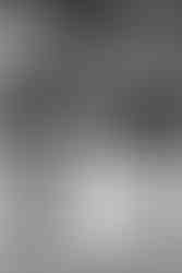 Bride and groom dancing slow dance on dance floor