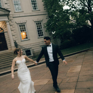 Bride and Groom Holding Hands and Walking