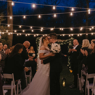 Bride and Groom Kissing at Ceremony