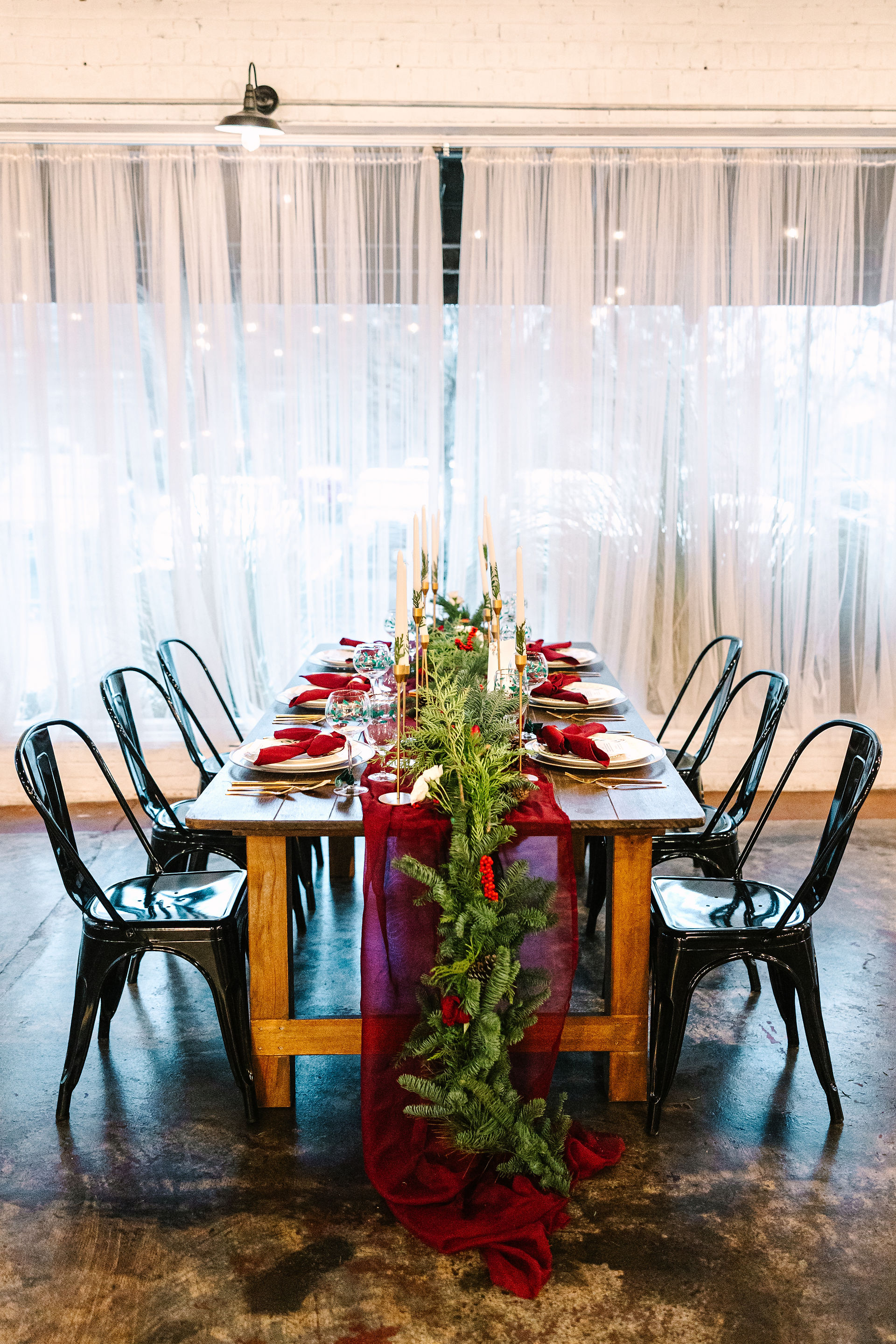 A Christmas themed wedding guest reception table