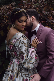 Groom kissing his bride on the cheek