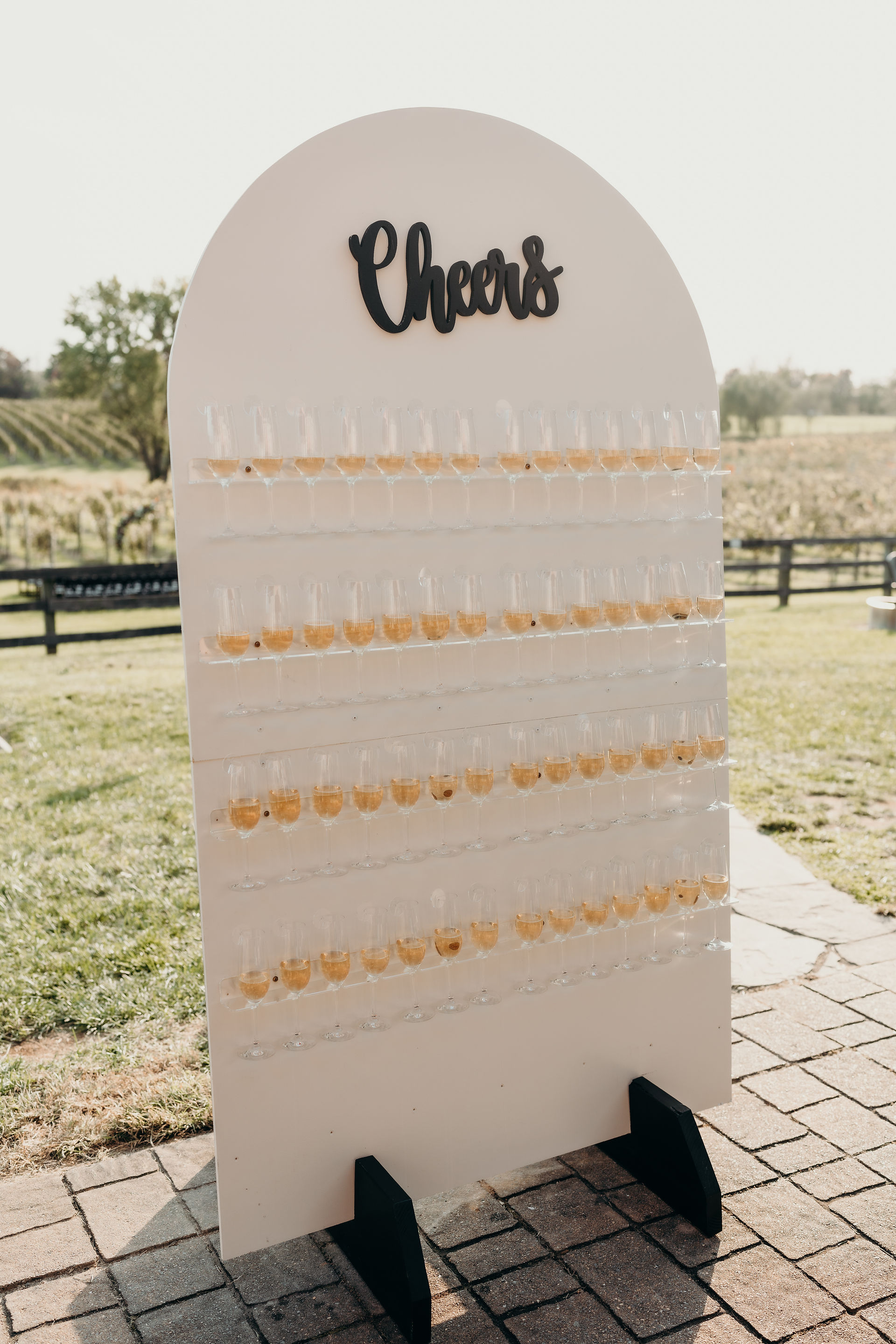 Champagne wall welcome sign