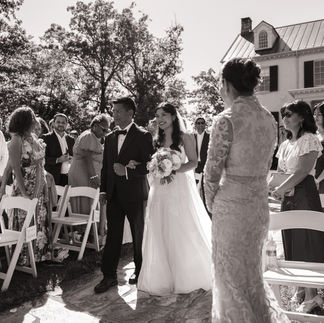Bride being escorted by her dad down the aisle