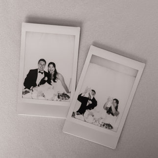 Polaroid photos of bride and groom