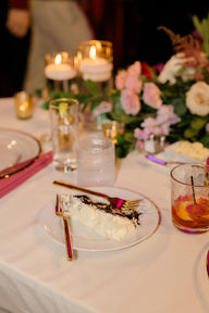A cake slice on a wedding table