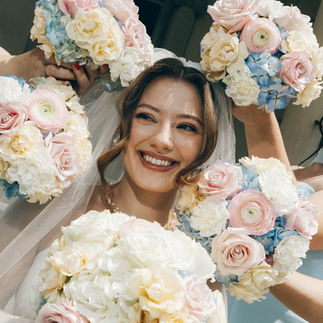 Bride Surrounded by Bridesmaids Bouquets