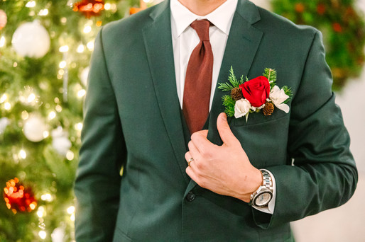 A groom with a floral pocket square