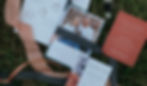 A set of wedding stationery with a picture of the couple and their dog on the invitation