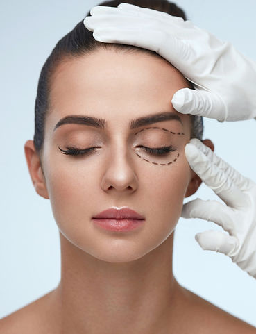 Closeup-Of-Beautician-Hands-Touching-Young-Female-Patient-Face-952848352_8660x5773_edited.