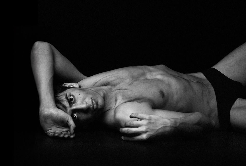 ChatGPT
Philippe's portfolio features some of the most intense photos of my career. In dramatic dim light, Philippe lies on his back, his body stained, which enhances the visual effect. His hands are raised as if seeking escape, while his intense gaze emerges from the shadows, capturing attention with its profound emotional impact. The contrast between the subdued light and the stains on his body creates an atmosphere of tension and mystery, turning each image into a poignant exploration of raw emotion and human vulnerability.