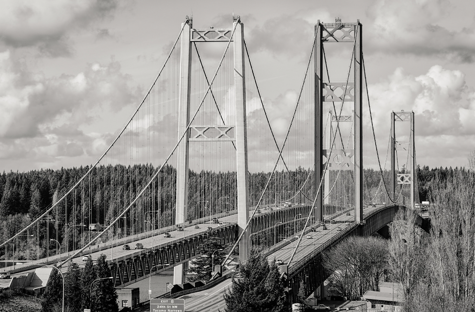 Black and white view of the Tacoma Narrows Bridge towers.
