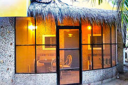 Screened in and mosquito free terrace at Antigua Lodge
