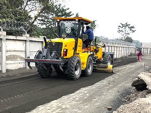 motor grader stone dust laying work