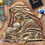 Thumbnail: upcycled repurposed gold/bronze color mother Mary holding baby Jesus - wisemen at bottom on camels