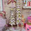 Thumbnail: rosegold Christmas diorama-nutcrackers-reindeer-glittery trees-snowflakes-star-bell-ornaments-drum