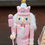 Thumbnail: pink and white nutcracker with white beard