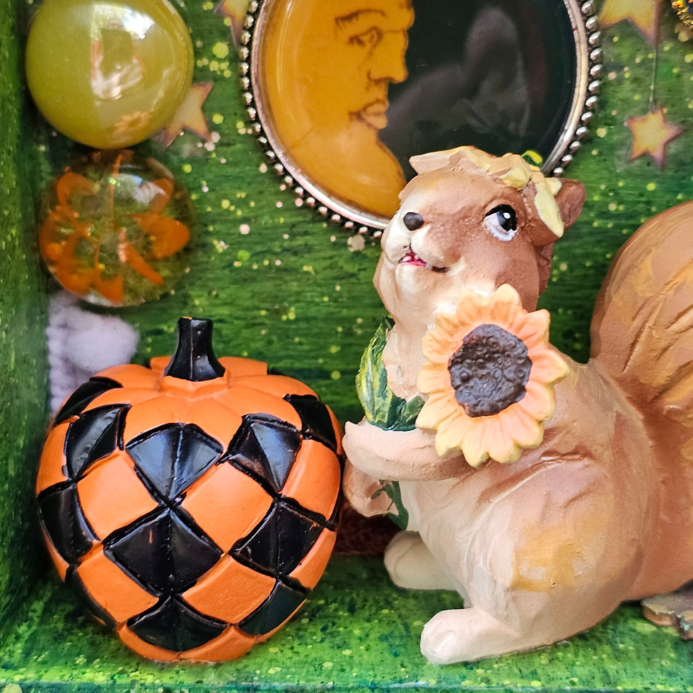 squirrel & pumpkin diorama-green w/yellow drawer pull on top-half moon pendant-glass pieces-fabric-star background