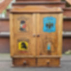 front of tavern box representing four different taverns from the 17 and 1800's