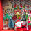 Thumbnail: Red Christmas diorama-santa-reindeer-present-stocking-bottle brush tree-6x4x1"