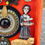 Thumbnail: creepy lady serving drinks on platter-yellow cat-BEWARE sign-upcycled jewelry-orange red box