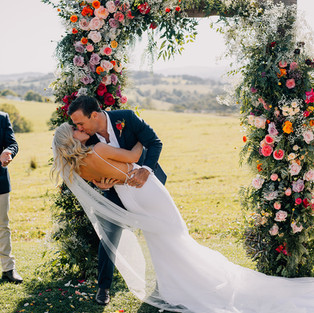 Bride and Groom kiss after celebrant pronounce them husband and wife at the wedding ceremony.