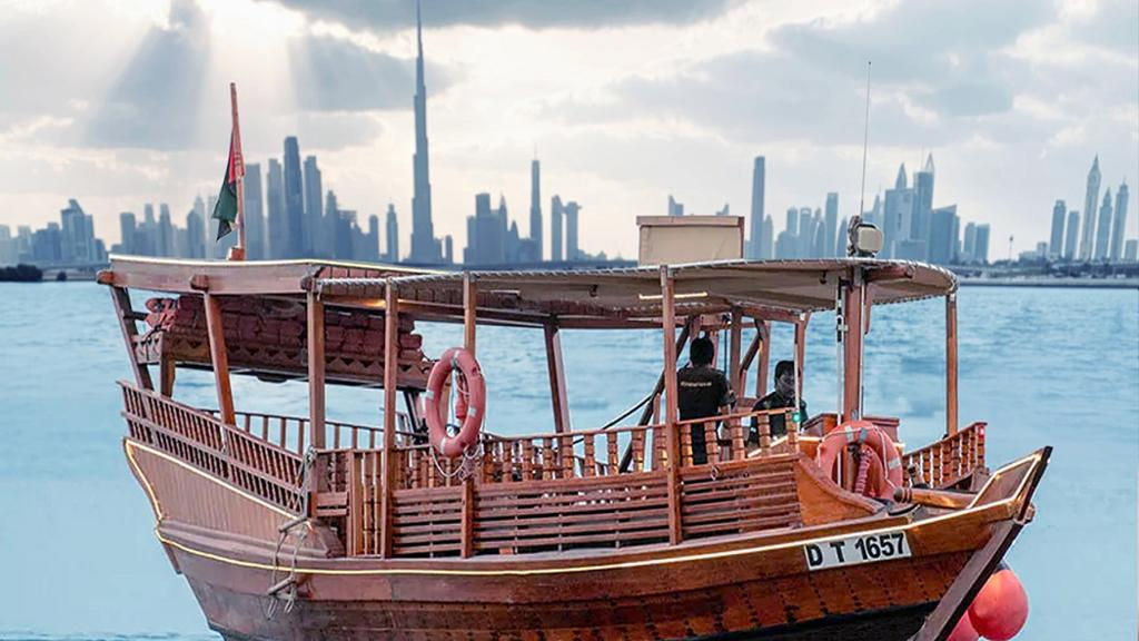 Burj Khalifa at Sunset by Abra - Tour with Transfers