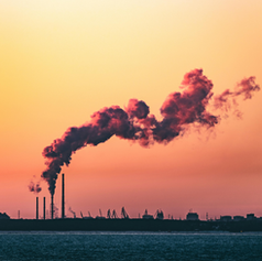 Smoke billowing from a factory