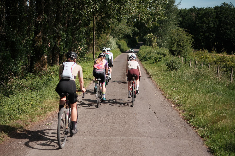 a group of cyclist heading out on rural roads of dorset