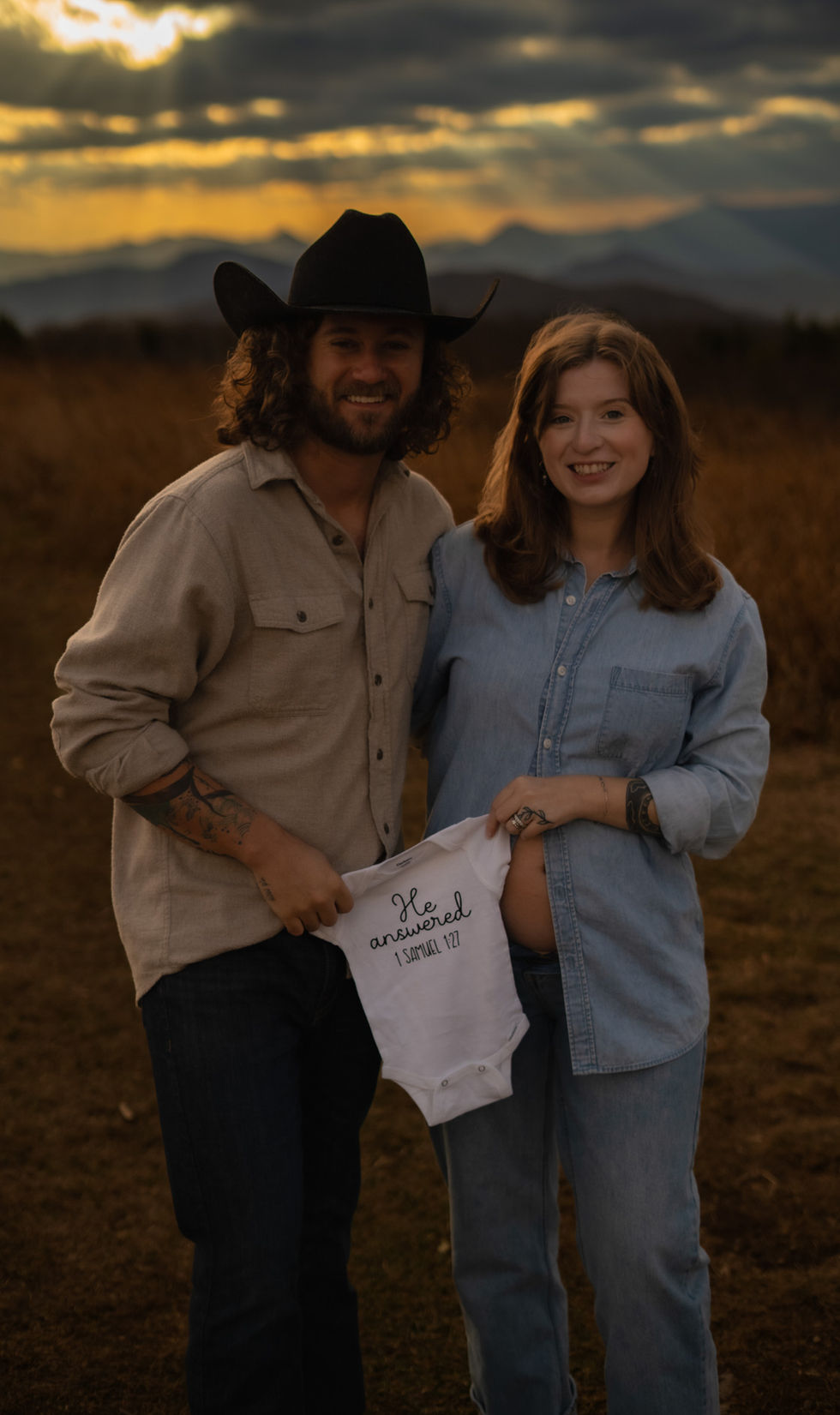 expecting couple standing together during maternity photoshoot Tennessee