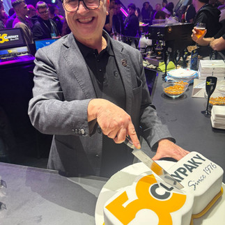 Alberico cutting 50th Celebrations Cake