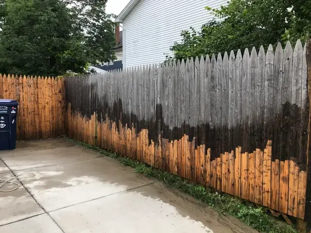 A painter working amidst an unpredictable weather backdrop