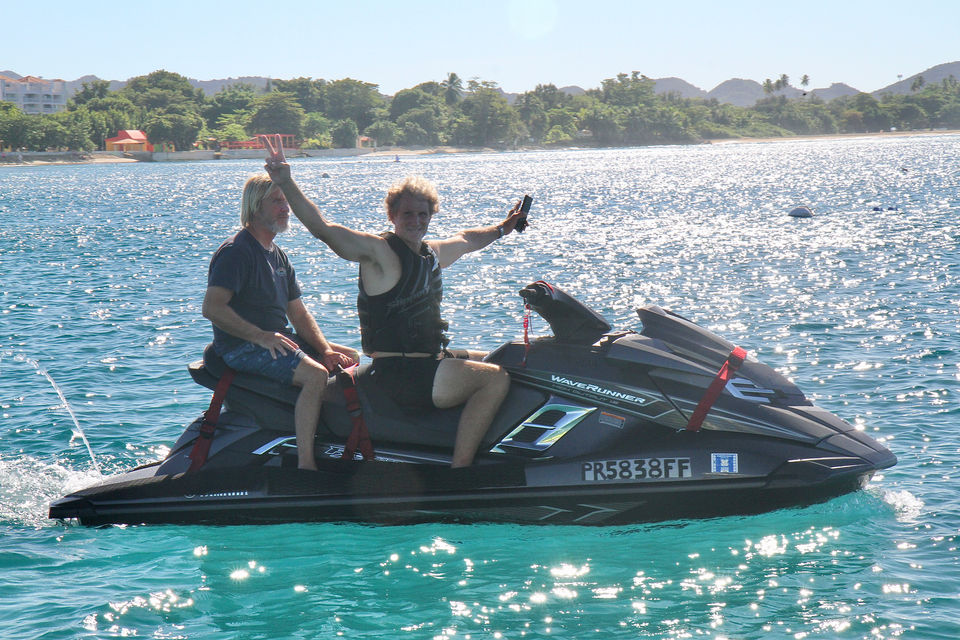 Two men enjoy a jet ski ride