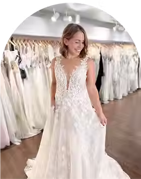 Bride wearing a wedding dress at a local bridal boutique.avif