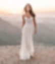 Bride wearing a romantic lace wedding dress from Weddings and Dreams bridal in Fremont CA