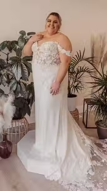 Bride in Off the Shoulder Lace Wedding Dress with Floral Train