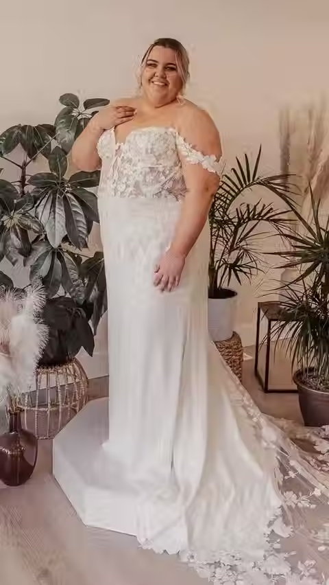 Bride in Off the Shoulder Lace Wedding Dress with Floral Train