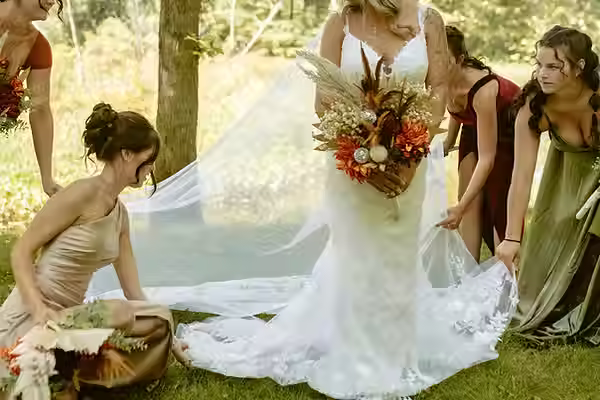 Bridal Party Adjusting Lace Wedding Train.avif