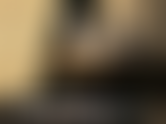 Crowd at the V&A East Museum entrance under a large logo. Text reads: "V&A East Museum opens this weekend in east London's Olympic park."