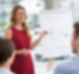 financial consultant presenting tax planning strategies to clients in a professional business meetin