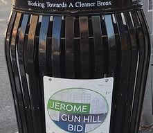 garbage can with Jerome Gun Hill logo