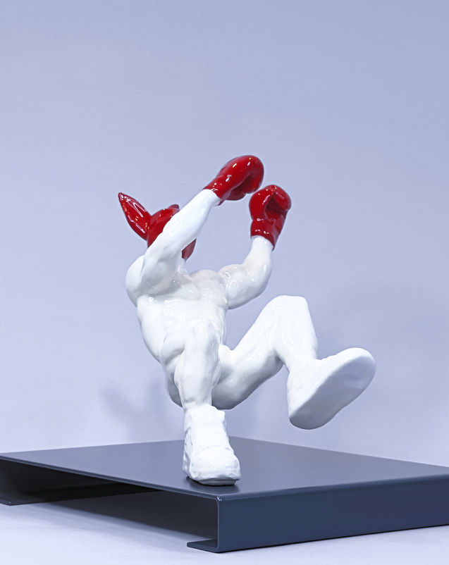 PUNCH ME BABY… by PORNOBUNNY, opposite front three-quarter view; muscular sculpture with boxing gloves on a stand