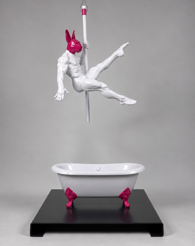 OLEG from CIRCUS LOVERS by PORNOBUNNY, front view; sculpture of a muscular figure with a rabbit head on a pole above a bathtub