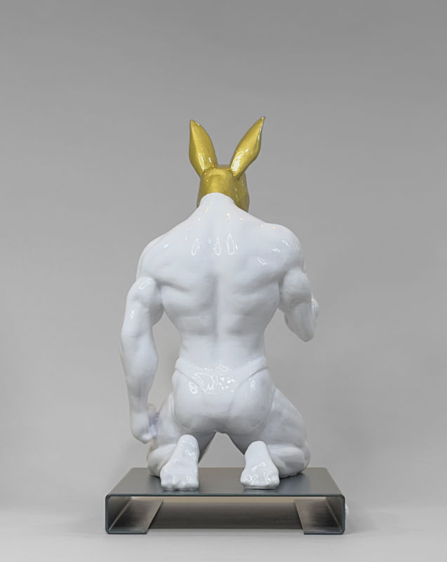 MR. BUNNY GOLD by PORNOBUNNY, rear view; muscular rabbit sculpture with ears kneeling