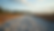 Eye-level view of a compacted gravel pole barn pad ready for construction