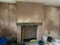 Plaster detailing around the fireplace