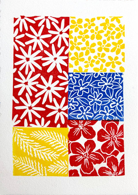 Linocut print in primary colors of floral patterns in a patchwork design on 5 x 7 inches white paper
