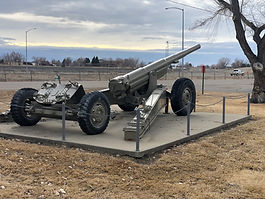 Nestled here at the corner of the Frontier Gateway Museum land, is a large piece of mobile artillery. Originally manufactured in France, the 155 mm 1917 field gun...