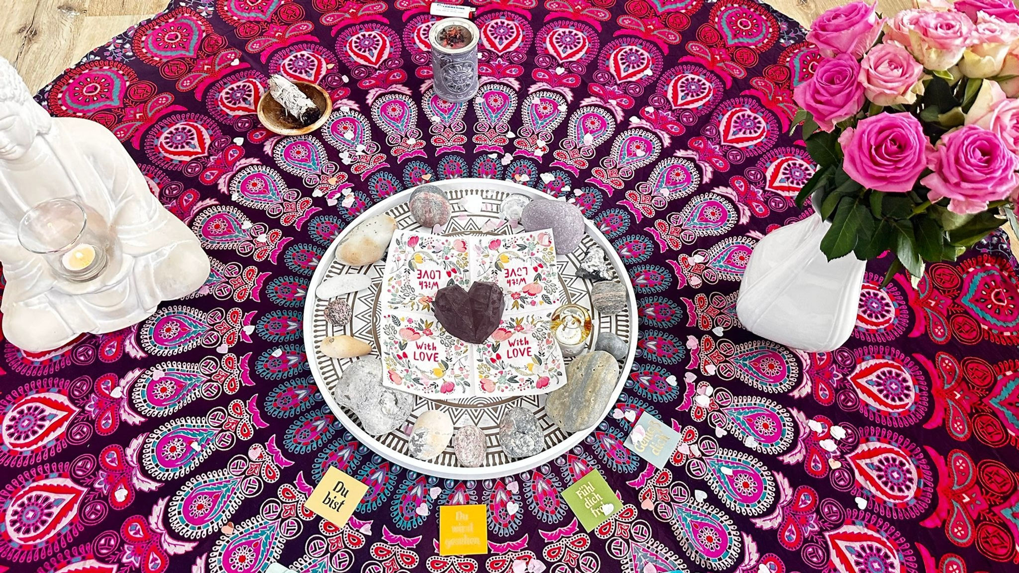Herzritual auf einem bunten Teppich