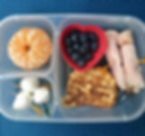 Healthy Lunchbox; French toast, tangerine, blueberries, ham and cheese, mozarella cheese balls